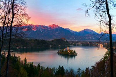 Scenic view of lake against sky during sunset