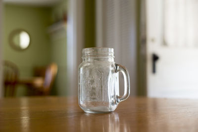 Close-up of water in jar on table