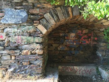 Graffiti on brick wall