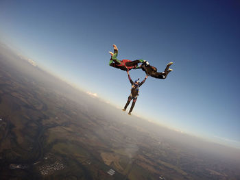 Man jumping flying in sky