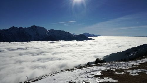 Scenic view of mountains against sky during winter