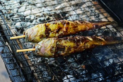 Close-up of meat on barbecue grill