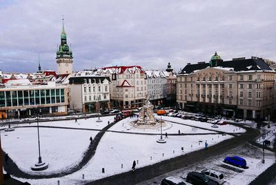 View of cityscape against sky during winter