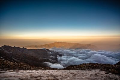 Scenic view of landscape against sky during sunset