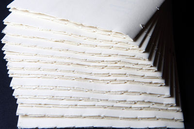 High angle view of bread on white surface