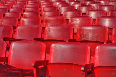 Full frame shot of red empty chairs