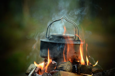 Close-up of burning fire on barbecue grill