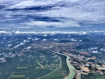 Aerial view of city buildings against sky