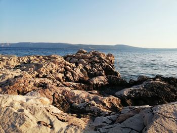 Scenic view of sea against clear sky