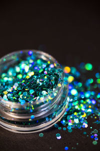 Close-up of green glitter used for decoration or nail design