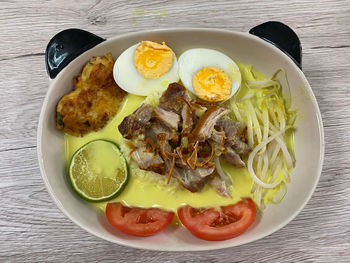 High angle view of breakfast served on table