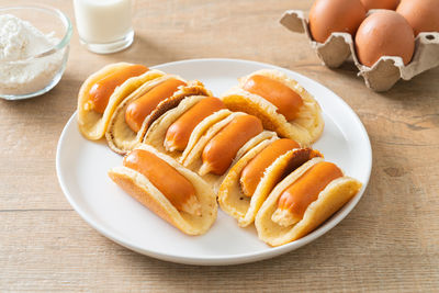 High angle view of breakfast served on table