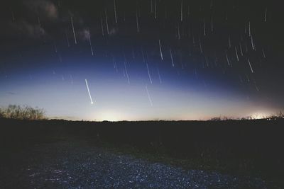 Scenic view of star field against sky at night