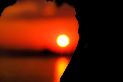 Close-up of illuminated orange sky at night