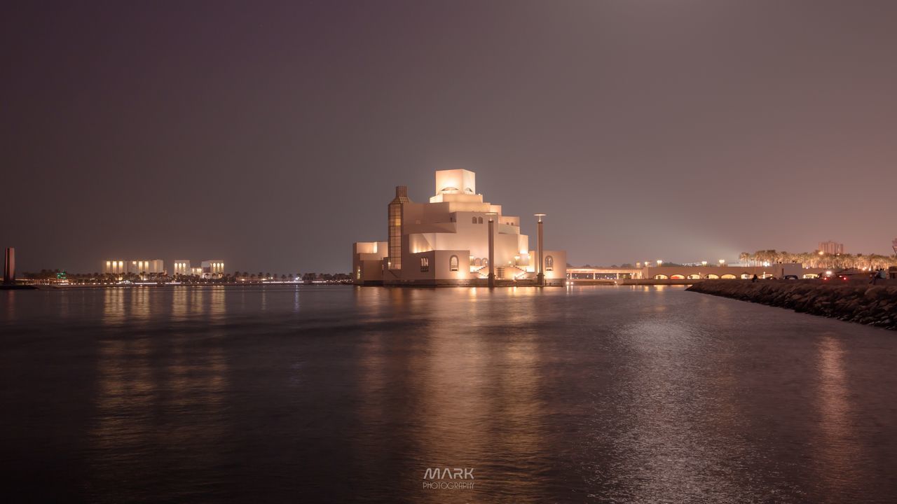 illuminated, night, architecture, built structure, building exterior, waterfront, reflection, water, river, no people, sky, outdoors, travel destinations, clear sky, nature, city