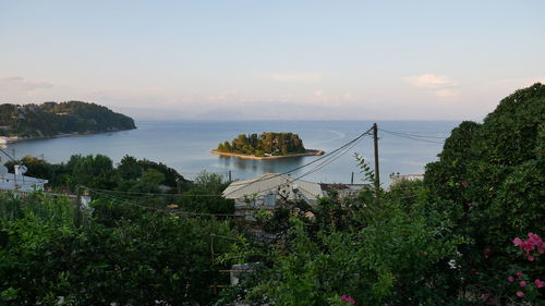 Scenic view of bay against sky