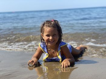 Cute girl smiling on beach