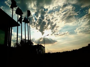 Silhouette trees against sky during sunset