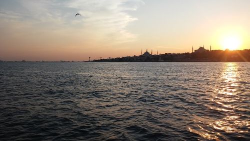 Scenic view of sea at sunset