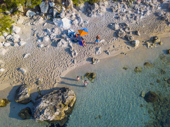 Aerial angle view people on beach