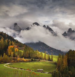 Scenic view of landscape against sky in dolomites mountains 