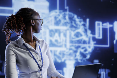 Young woman using digital tablet