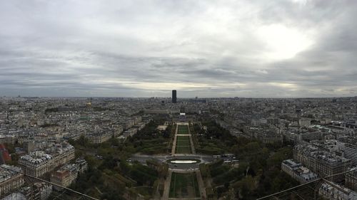 High angle view of buildings in city against sky