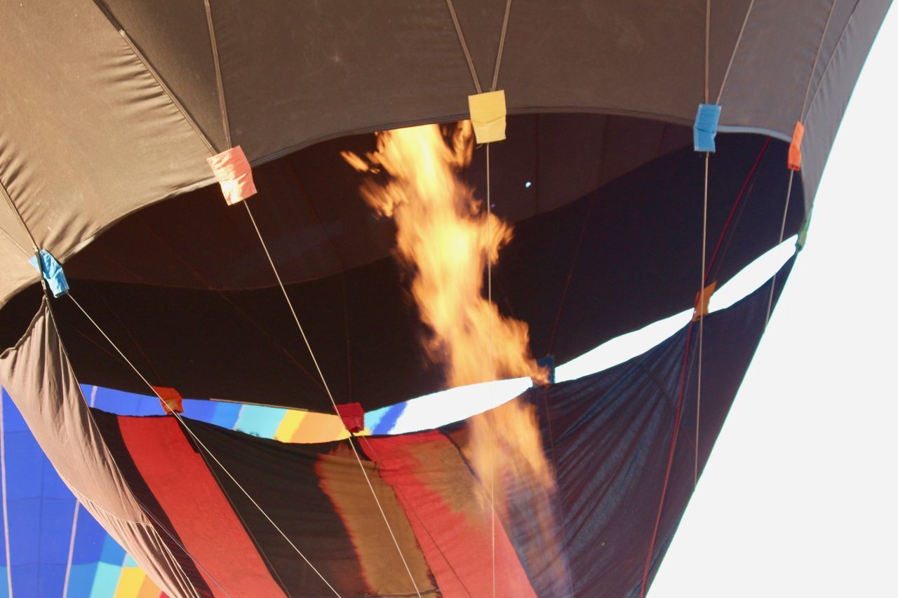 CLOSE-UP OF HOT AIR BALLOON IN BOAT