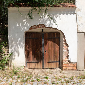 Closed door of abandoned house