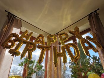 Low angle view of happy birthday sign