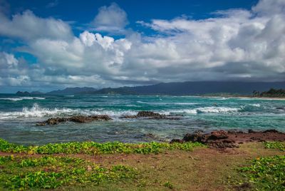 Scenic view of beach against sky