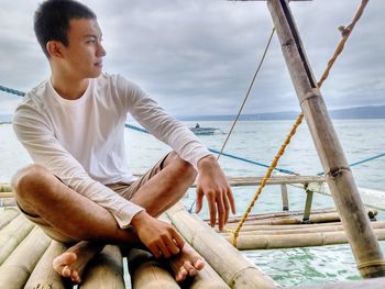 Man standing on pier