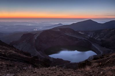 Scenic view of landscape at sunset