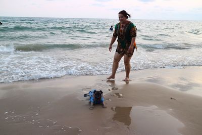 Full length of woman on beach