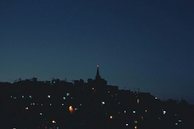 View of illuminated buildings at night