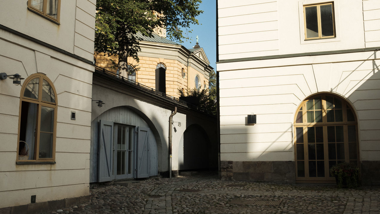 LOW ANGLE VIEW OF BUILDING AND STREET