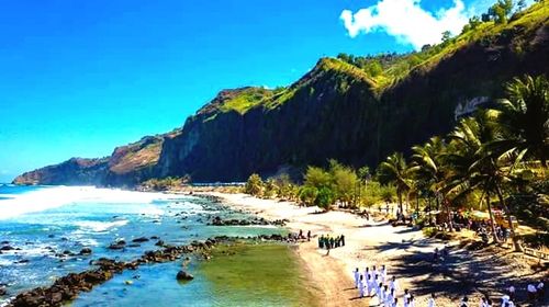 Scenic view of sea against clear blue sky