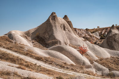 Scenic view of desert against clear sky