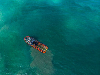 High angle view of boat moving on sea