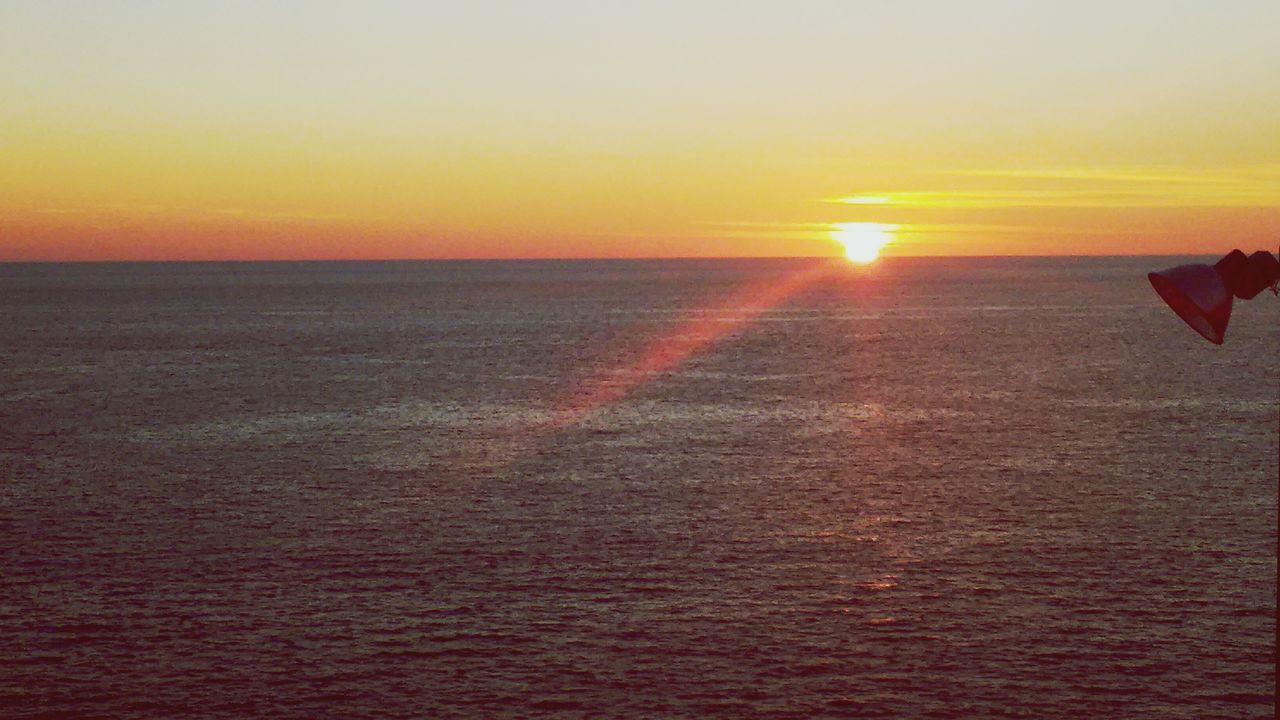 sunset, sea, horizon over water, orange color, sun, water, scenics, tranquil scene, beauty in nature, tranquility, idyllic, nature, sky, clear sky, copy space, beach, sunlight, seascape, rippled, waterfront