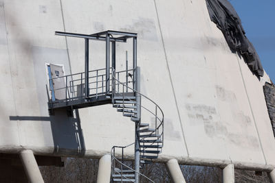 Low angle view of spiral staircase in building