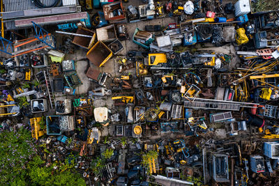 Aerial view of a scrapyard full of scrap metal and vehicles