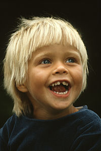 Close-up portrait of smiling boy