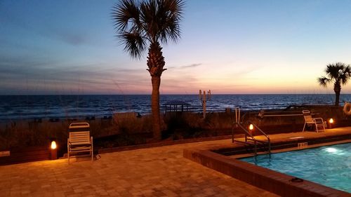 Scenic view of sea at sunset