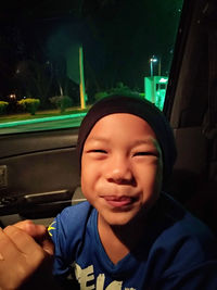 Portrait of boy in car