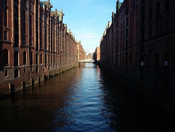View of canal along buildings