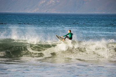 Man surfing in sea