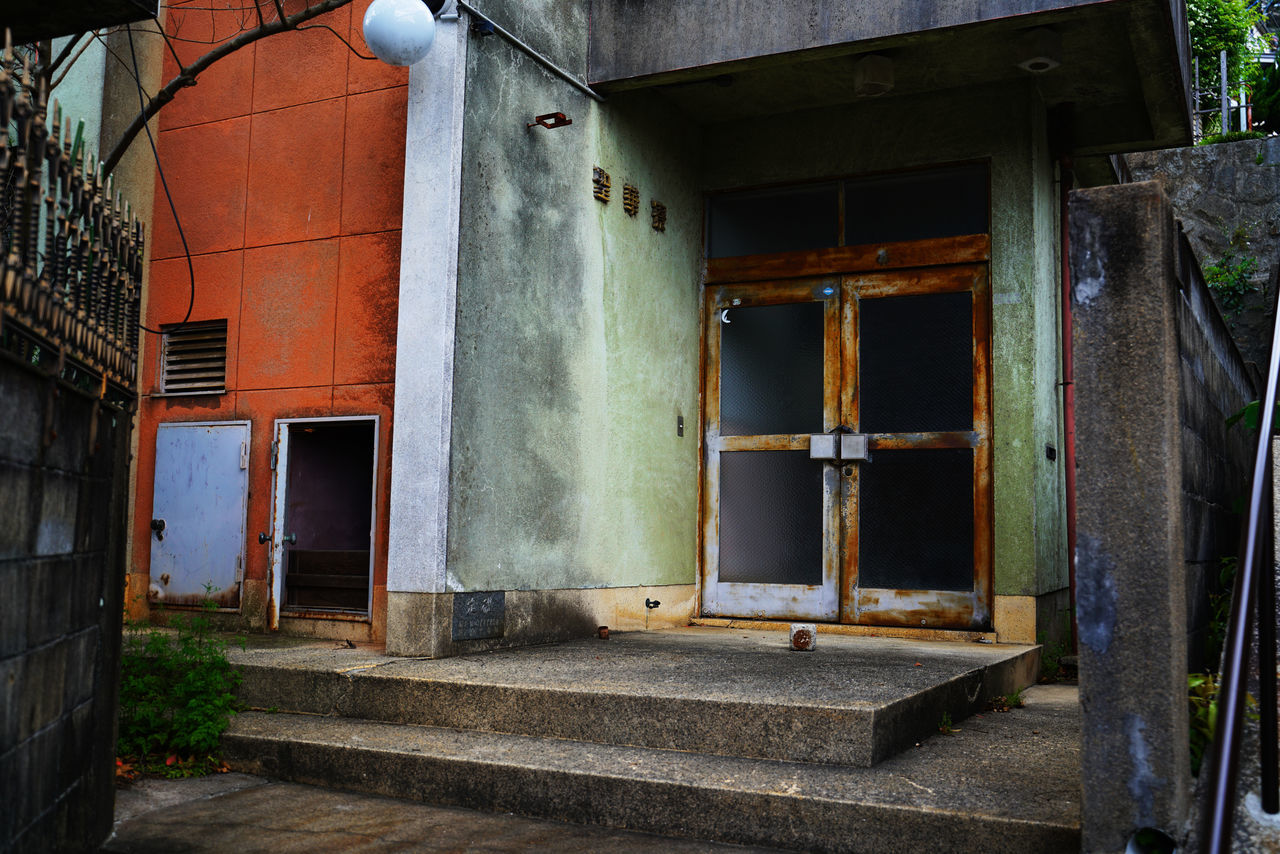 urban area, architecture, built structure, house, building, building exterior, street, abandoned, alley, entrance, door, no people, road, old, window, rundown, damaged, wall, history, residential district, day, staircase, outdoors, home, wall - building feature, weathered, wood, city, ruined, decline, deterioration, nature