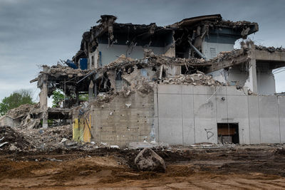 Abandoned building against sky