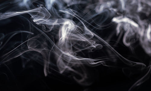 Close-up of smoke against black background